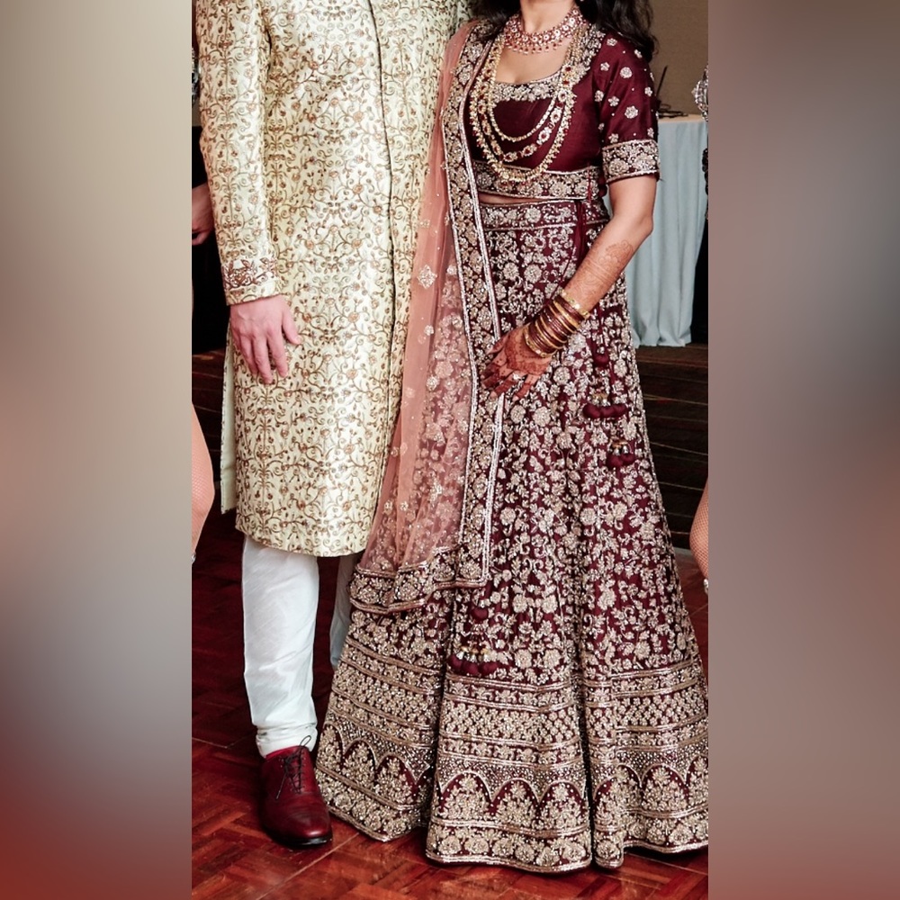 Bridal lehnga - heavy intricate work. Deep maroon & blush and antique gold work